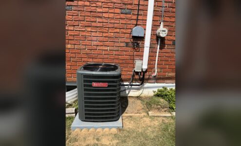 Outdoor air conditioning condenser installed by Unity Heating & Air Conditioning at a Lehigh Valley home