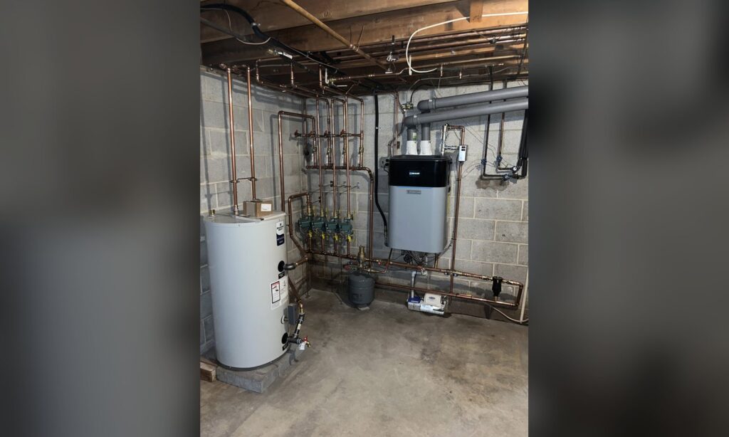 Gas boiler and hot water storage tank installed by Unity Heating & Air Conditioning