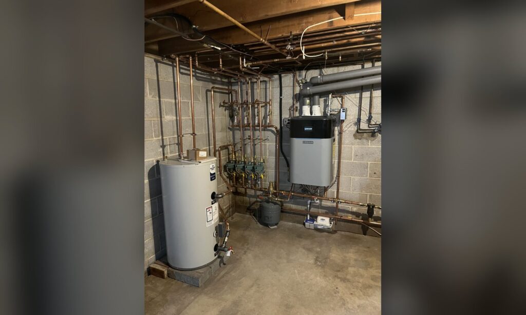 Gas boiler and hot water tank installed by Unity Heating & Air Conditioning
