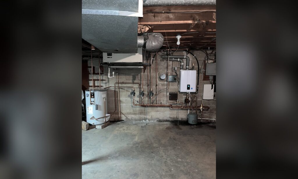 Same basement after Unity Heating & Air Conditioning replaced the old boiler with a wall-hung condensing boiler and new copper