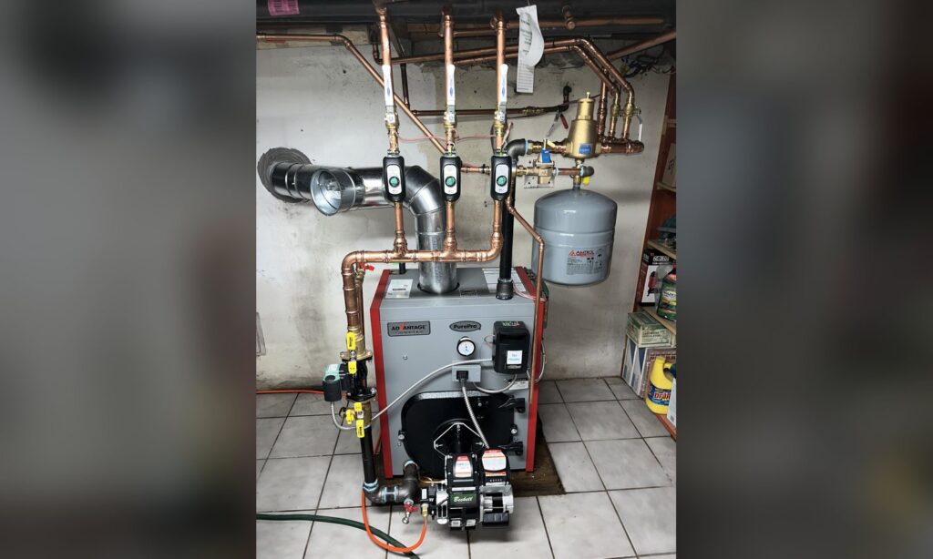 Oil boiler with Beckett burner installed by Unity Heating & Air Conditioning