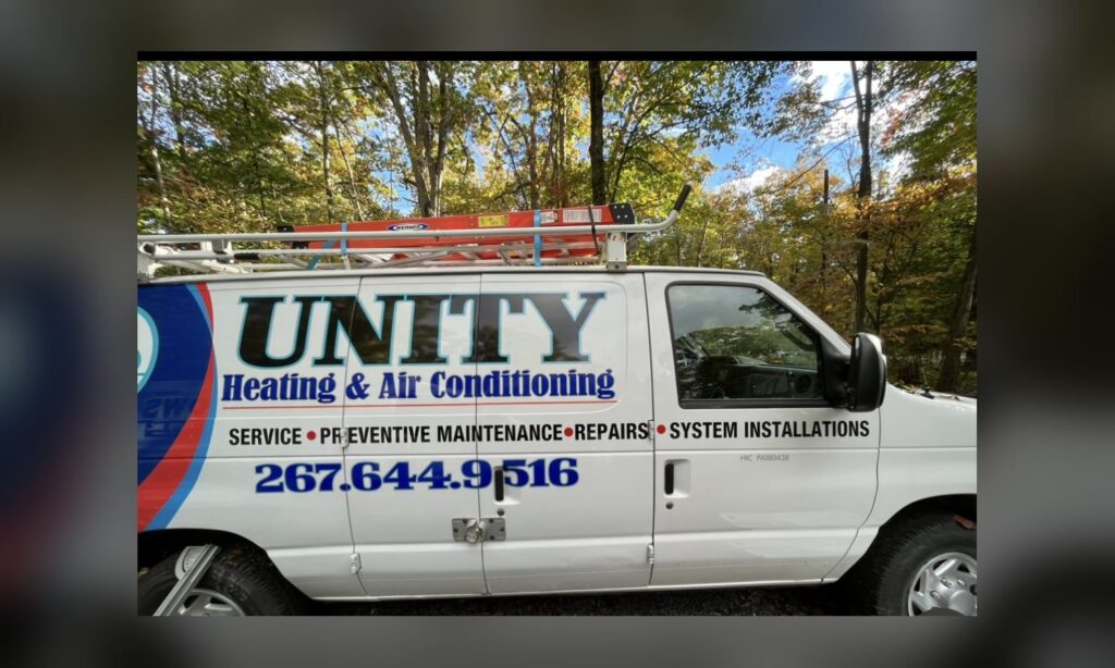 Unity Heating & Air Conditioning service van parked at a job in Macungie, PA