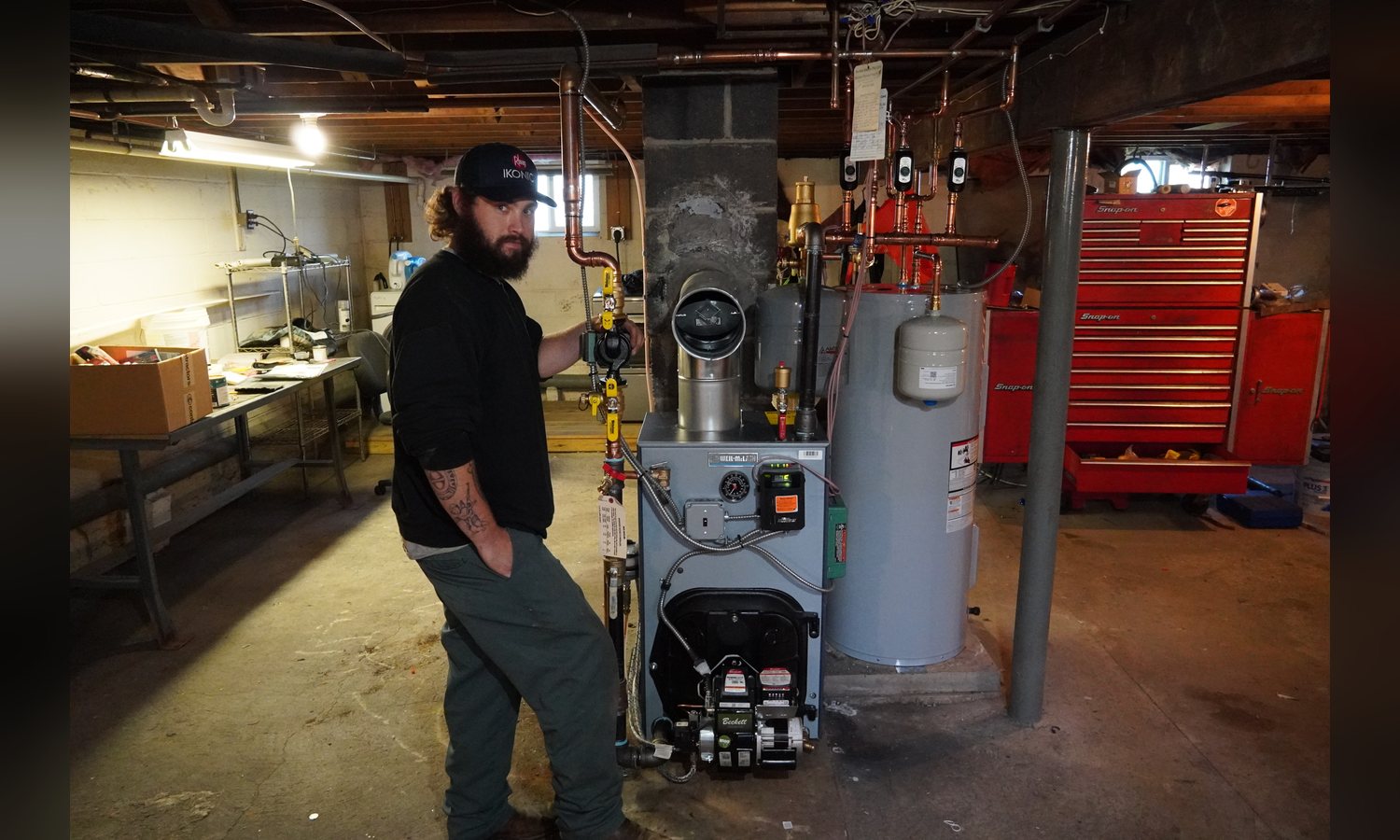 Unity Heating & Air Conditioning technician commissioning a newly installed oil boiler