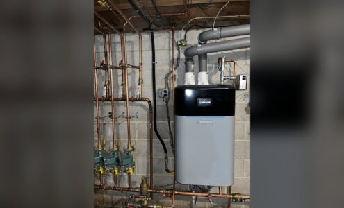 Wall-hung gas condensing boiler and indirect water heater installed by Unity Heating & Air Conditioning